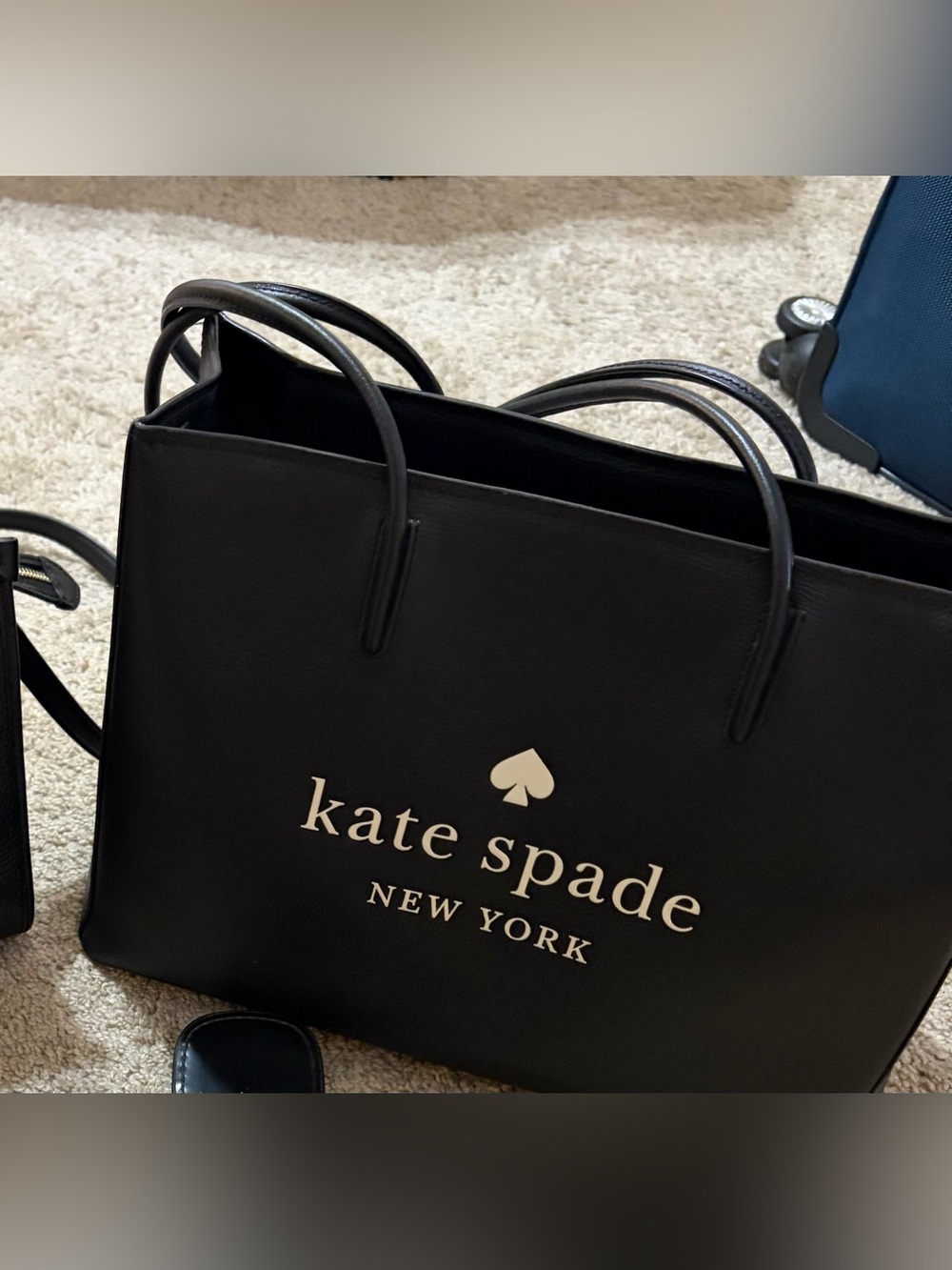 kate spade black leather logo tote great condition no scratches inside clean .